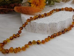 COLLIER BÉBÉ AMBRE COGNAC